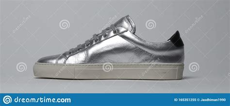 silver color sneakers.